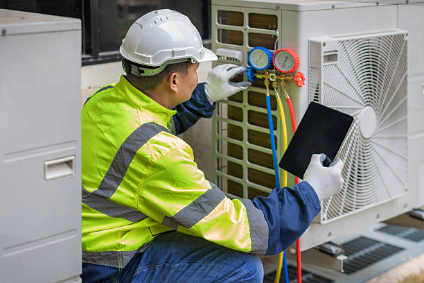 Professional Heat Pump Repair technician working in Osceola, IN